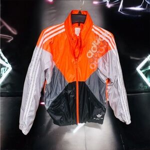 Rare vintages Adidas original ,the class of 84” windbreaker Orange, black Size M